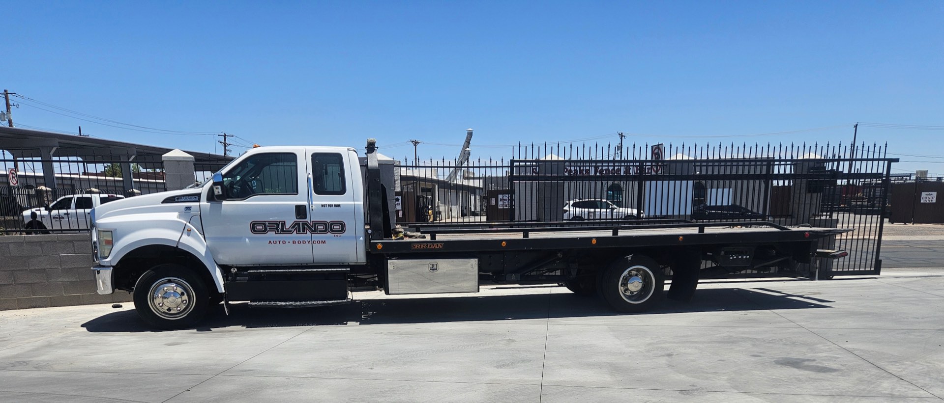 Orlando Auto Body tow truck responding to get a damaged vehicle to the shop