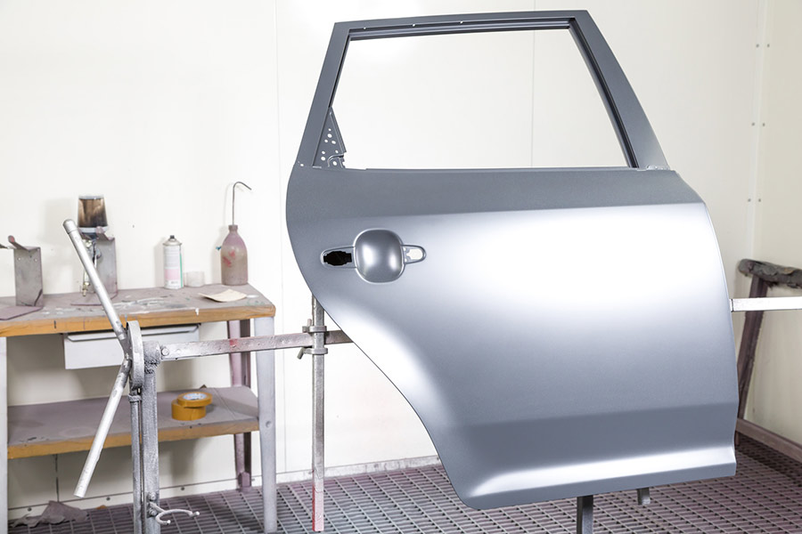 A replacement door prepared in advance for Fast Track collision repair