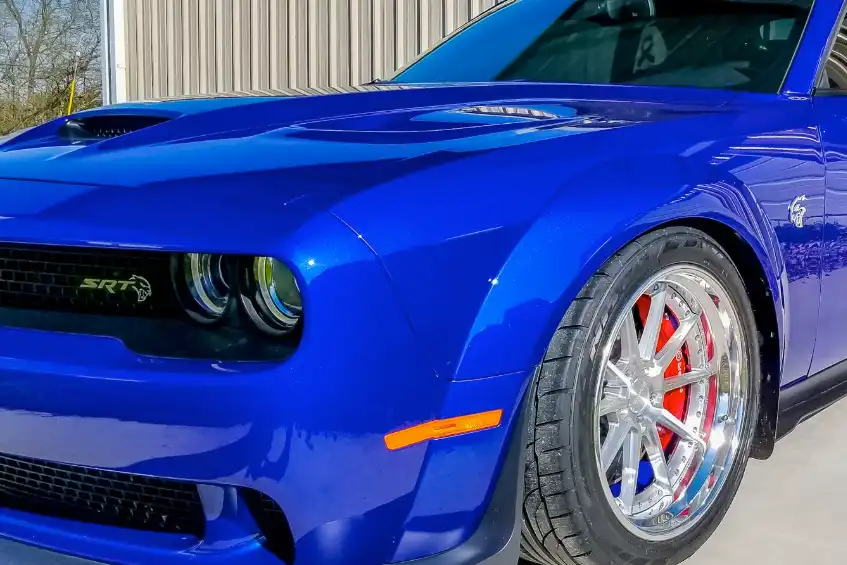 Dodge headlamp and front-end damage under repair